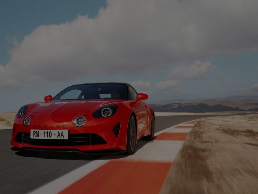 Alpine A110 On A Race Track