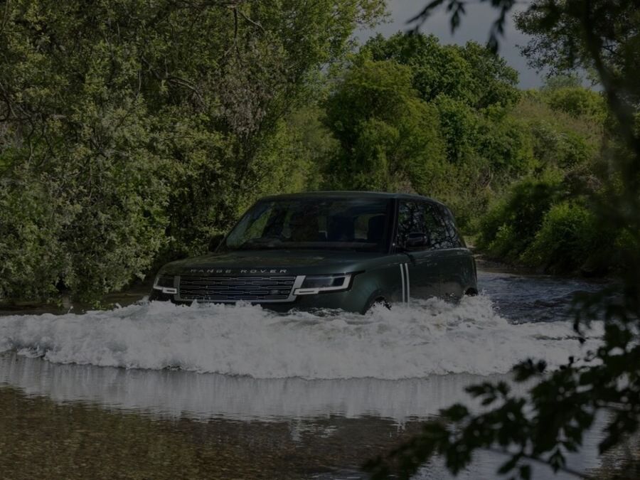 Range Rover Electric Wading In River